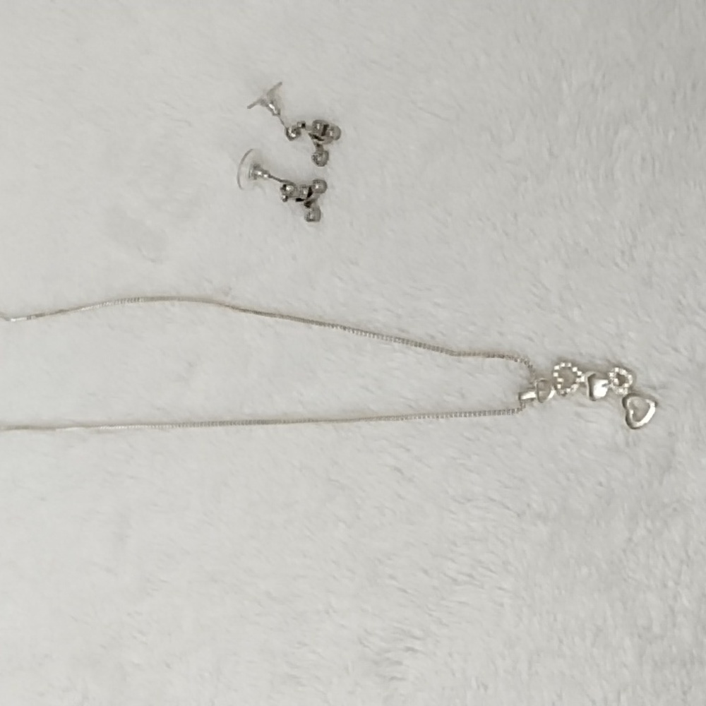 Silver heart shape necklace and earring set